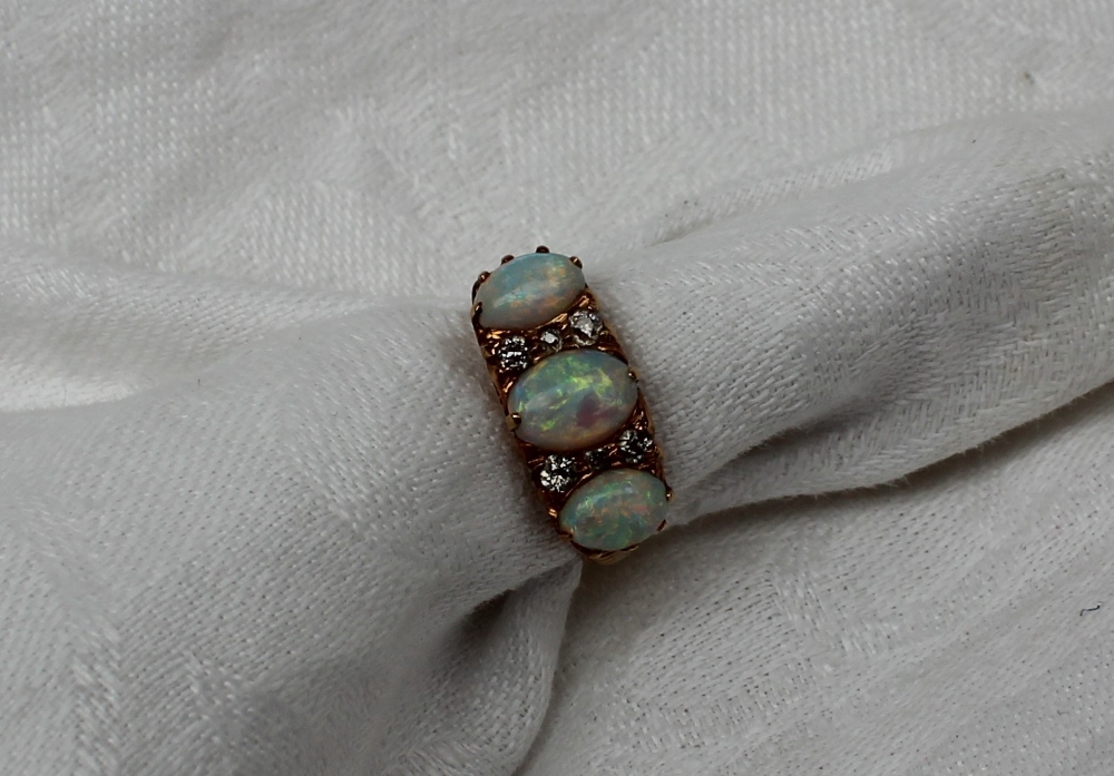 An opal and diamond dress ring,