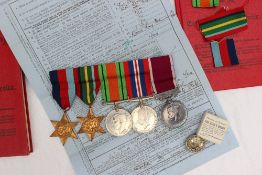 A set of five World War II medals including War medal, Defence medal, The 1939-1945 Star,