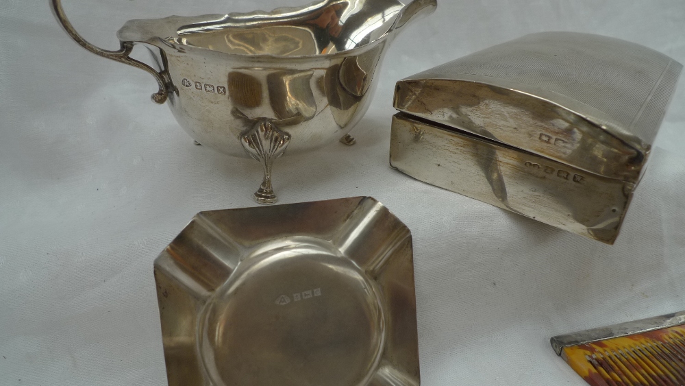 A George VI silver sauce boat, Birmingham, 1947, together with a silver cigarette box, - Image 3 of 3