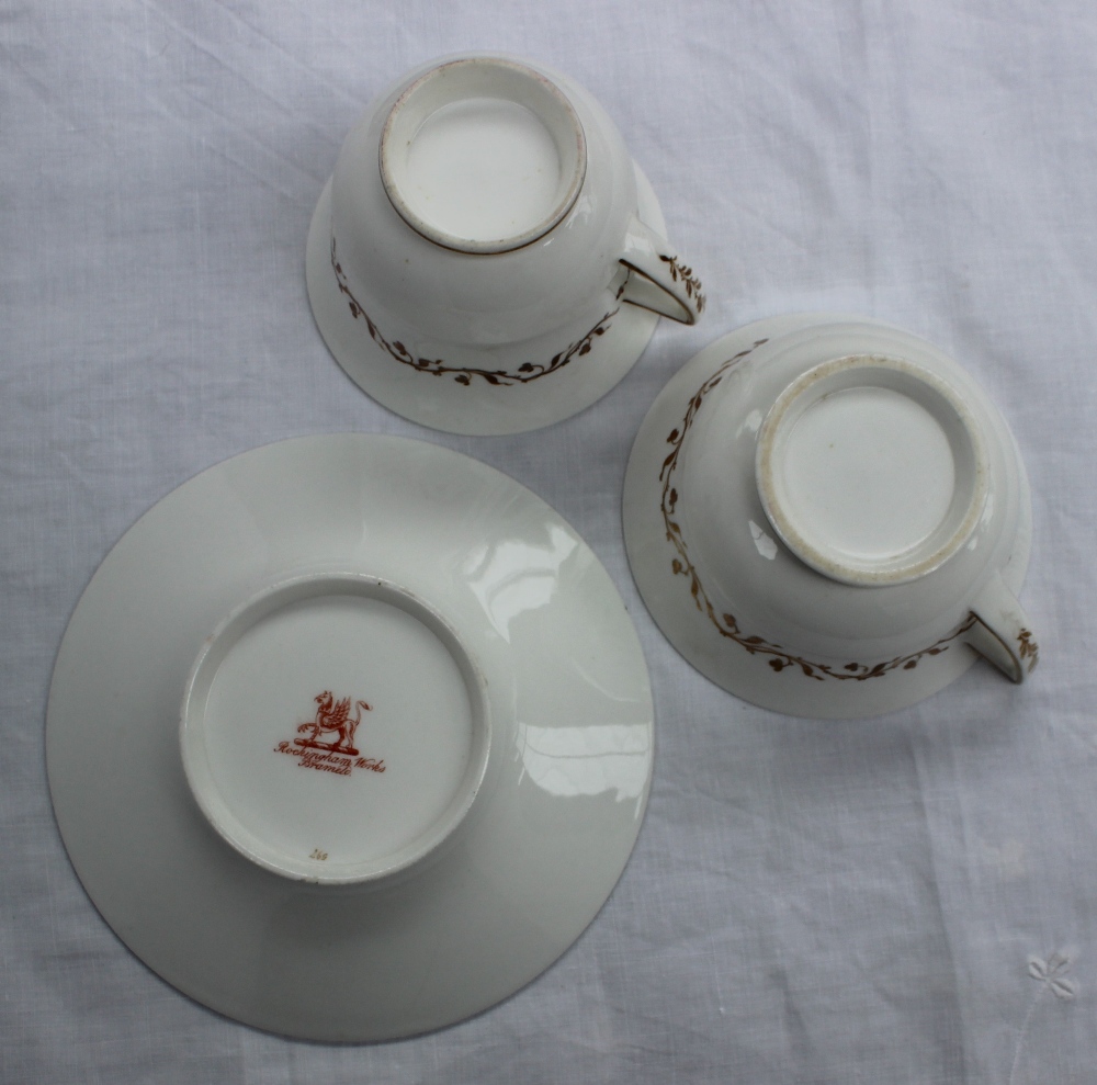 A trio of Rockingham porcelain breakfast cup, teacup and saucer, - Image 3 of 4