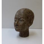 A hardstone carving of an African head,
