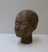 A hardstone carving of an African head,