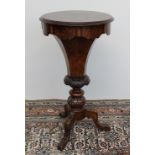 A Victorian walnut work table,