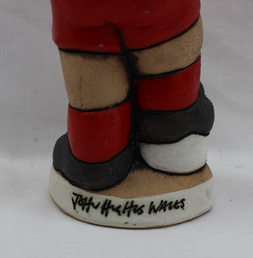 A John Hughes pottery Grogg of Ian Rush, with arms folded and foot raised on a football, - Image 4 of 5