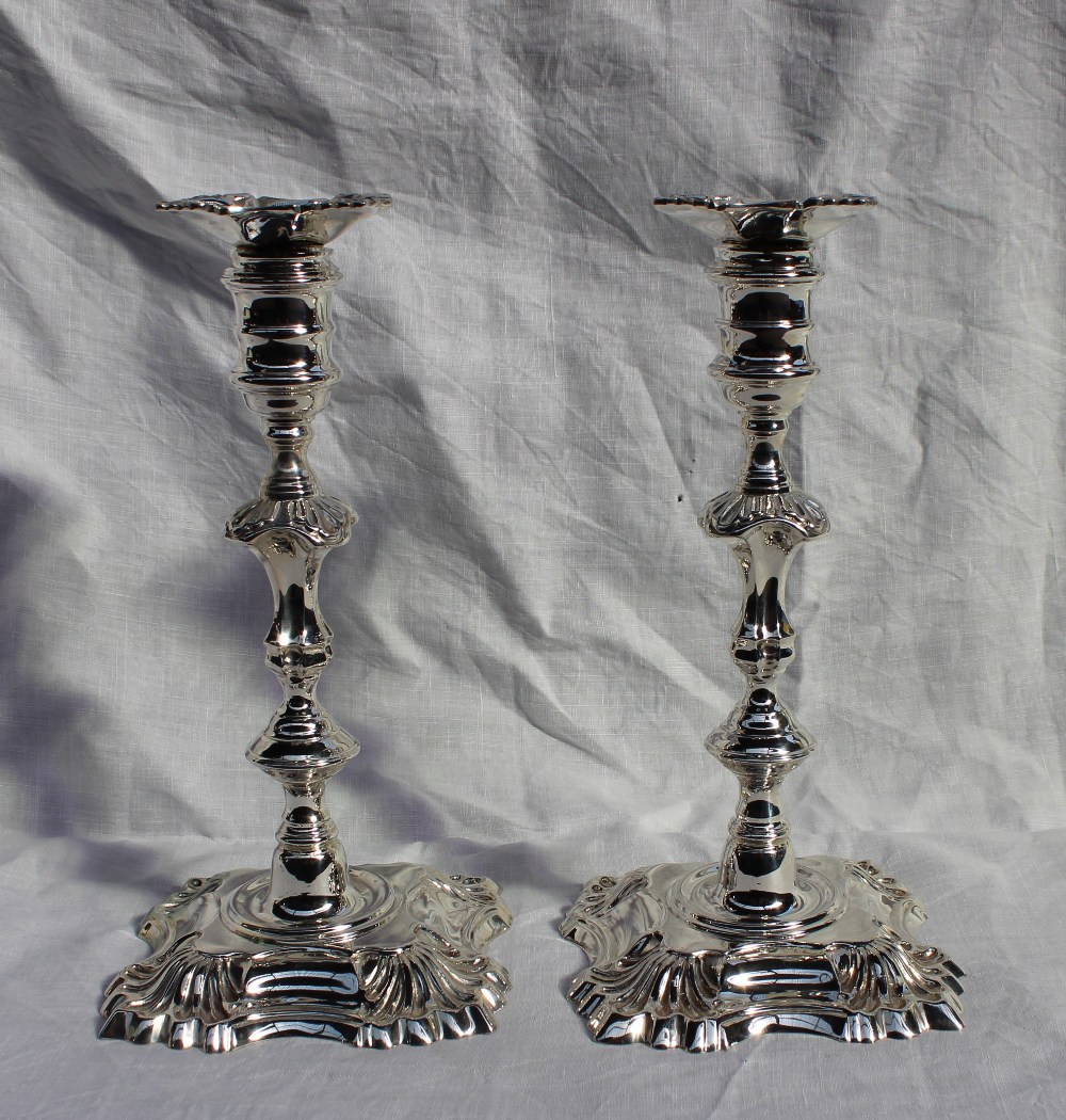 A pair of Elizabeth II silver candlesticks,