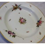 A Swansea porcelain bowl with a gilt scalloped rim painted with sprays of garden flowers, unmarked,