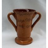 A Clay Pits Pottery Ewenny twin handled loving cup,