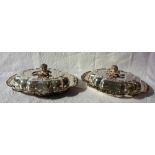 A pair of electroplated entree dishes and covers with fruit cast removable handles,
