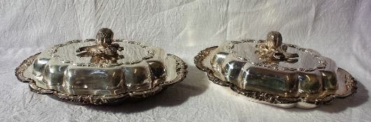 A pair of electroplated entree dishes and covers with fruit cast removable handles,