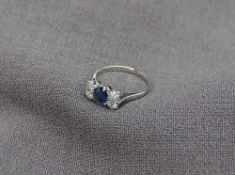 A sapphire and diamond ring,