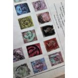 A stamp album, containing world stamps including a Penny Black, Penny Red,