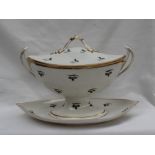 A 19th century English pottery twin handled tureen, cover and stand,