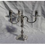 An Elizabeth II silver three branch candelabra,