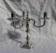 An Elizabeth II silver three branch candelabra,