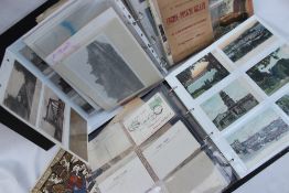 Two postcard albums containing circa five hundred postcards including scenes of Cape Colony,