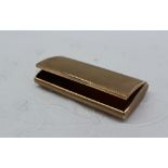 A 9ct yellow gold snuff box of rectangular form with engine turned decoration,
