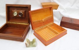 A humidor together with a leather cigar / cigarette box and two cigarette boxes **From the