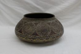 An Anglo-Indian brass, copper and white metal mounted shallow bowl decorated with script,