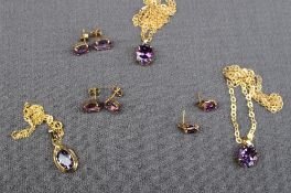 Two pairs of 9ct yellow gold amethyst set earrings together with another pair of earrings and three