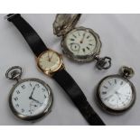 A white metal open faced keyless wound pocket watch,
