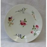 A Swansea porcelain plate with a dished rim, painted with sprays of garden flowers,