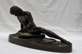 After the antique - a bronze model of the dying Gaul, on an oval base,