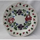 A Dillwyn Swansea Persian rose pattern plate decorated with pink, purple and blue flowers,