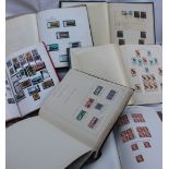 A large quantity of New Zealand stamps contained in six albums dating from 1873 - 1996