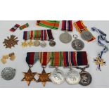 A set of four World War II medals including The 1939-1945 star, The Africa Star,