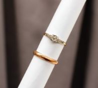 A solitaire diamond ring,