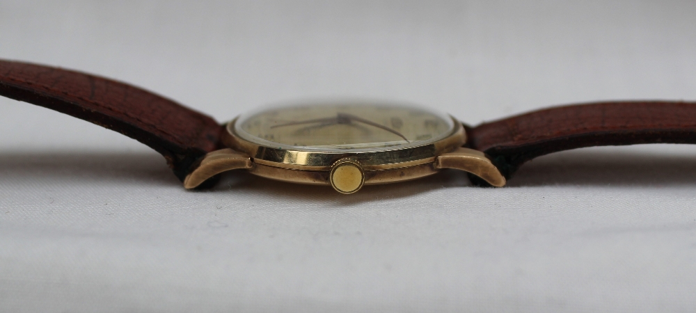 A 9ct yellow gold Gentleman's wristwatch the dial with Arabic numerals and a seconds subsidiary - Image 3 of 4