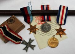 Three World War II medals including The War Medal, The 1939-1945 Star, The France and Germany Star,
