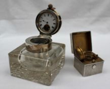 An early 20th century silver topped and glass inkwell,