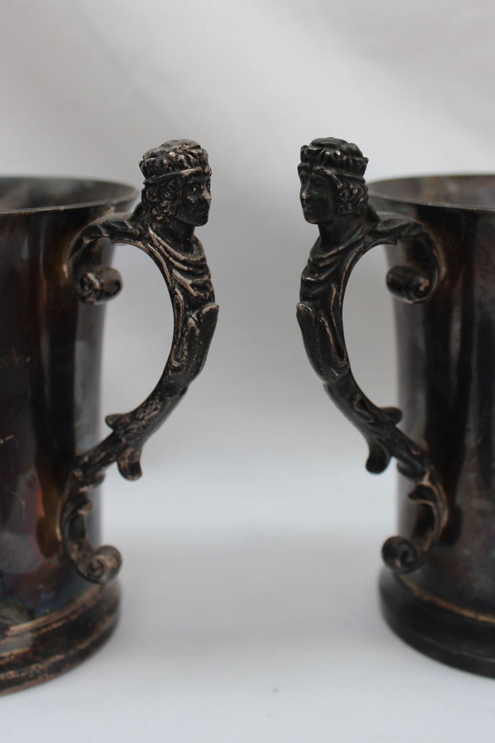 A pair of Elizabeth II silver tankards, the handle with a crowned head and leaves, - Image 3 of 3