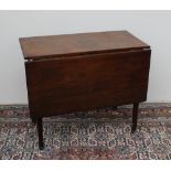 A 19th century mahogany table, the moulded top with a drop flap on square tapering legs and casters,