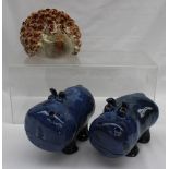 A pair of John Hughes pottery models of Hippopotamus, in a mottled blue and green glaze, initialled,