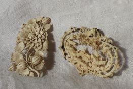 A late 19th / early 20th century ivory brooch possibly German of oval form carved with mountain