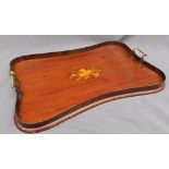 An Edwardian mahogany tray of pinched rectangular form decorated to the centre with musical