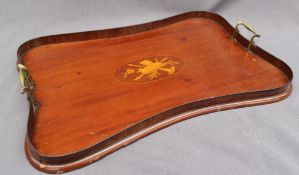 An Edwardian mahogany tray of pinched rectangular form decorated to the centre with musical