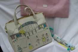 A Radley 'Lido' handbag together with a matching umbrella CONDITION REPORT: Overall