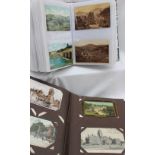 Two postcard albums containing circa 430 postcards depicting scenes in Haverfordwest, Swansea,