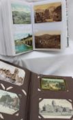 Two postcard albums containing circa 430 postcards depicting scenes in Haverfordwest, Swansea,