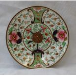 A Swansea porcelain plate, with a gilt line rim,