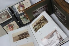 Two postcard albums, including circa 240 postcards depicting portrait cards, soldiers,
