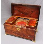 A George III mahogany tea caddy, of rectangular form with rosewood crossbanding,