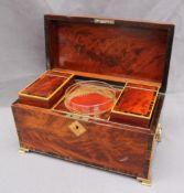 A George III mahogany tea caddy, of rectangular form with rosewood crossbanding,