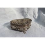 A George V silver jewellery box, of lobed shape with a pierced lid and sides decorated with birds,