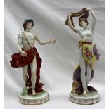 A pair of 19th century English porcelain figures,