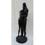 A Leonardo Artworks Inc 1968, painted plaster model of lovers on a circular base,