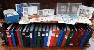 A large quantity of British stamps contained in 22 albums and some loose, mainly unused,
